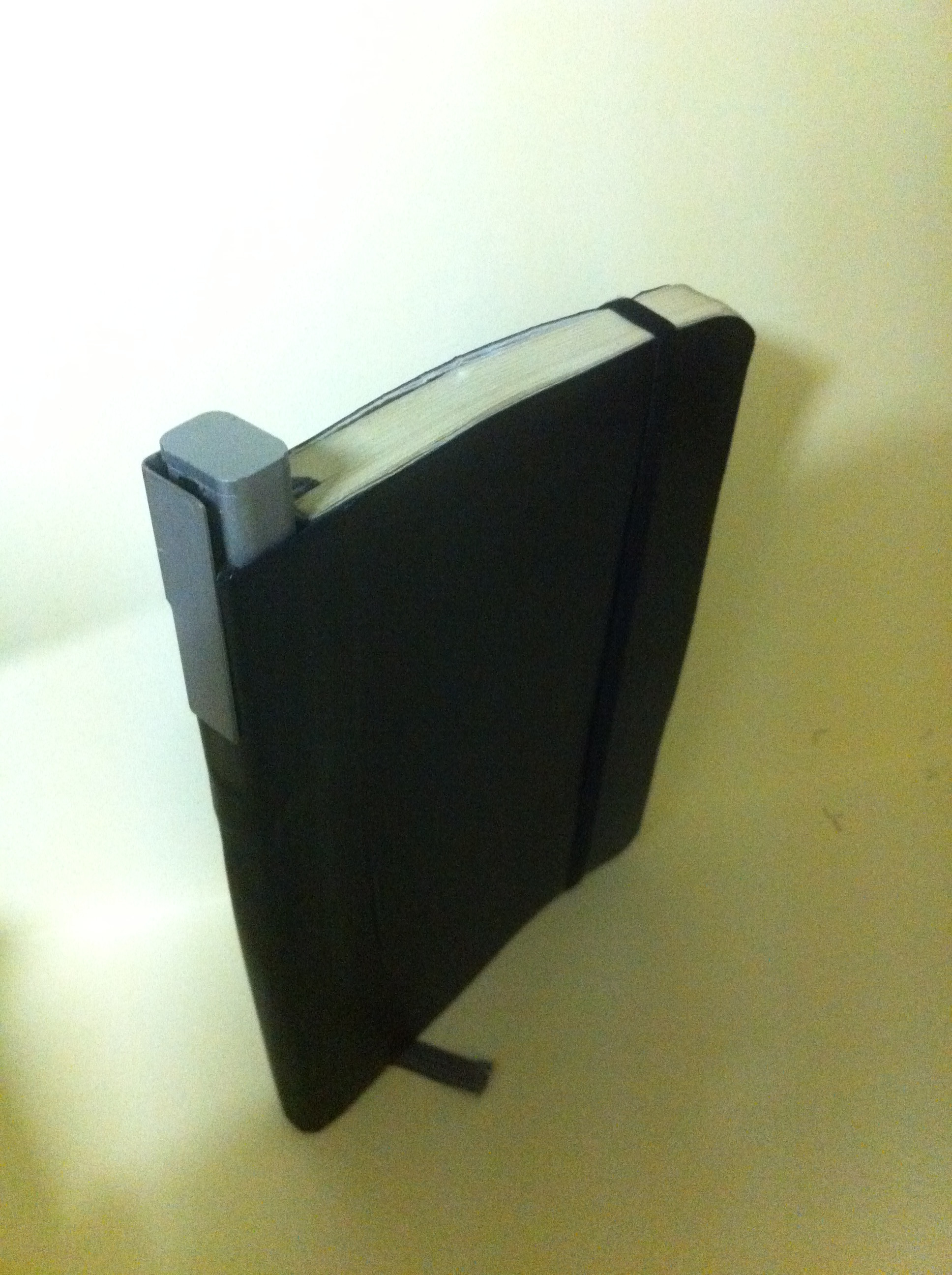 Pen holder for hip pocket moleskine