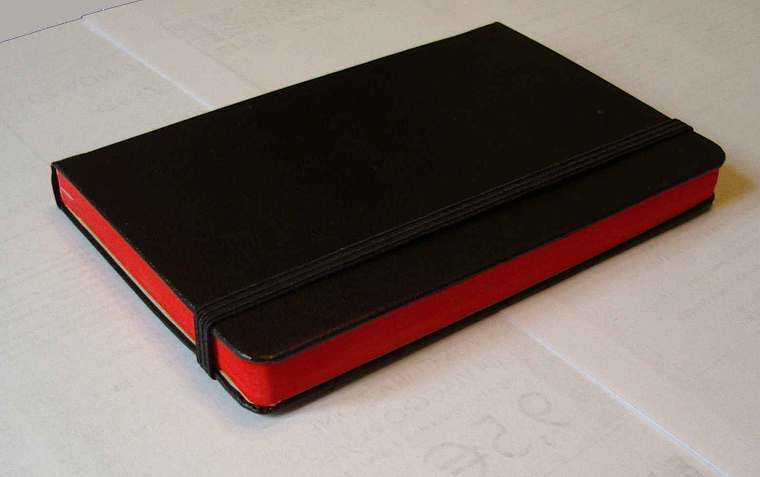 Moleskine red line notebook