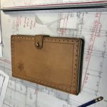 Hand sewn leather cover