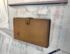 Hand sewn leather cover
