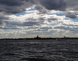 Statue of Liberty covered by an ocean of clouds