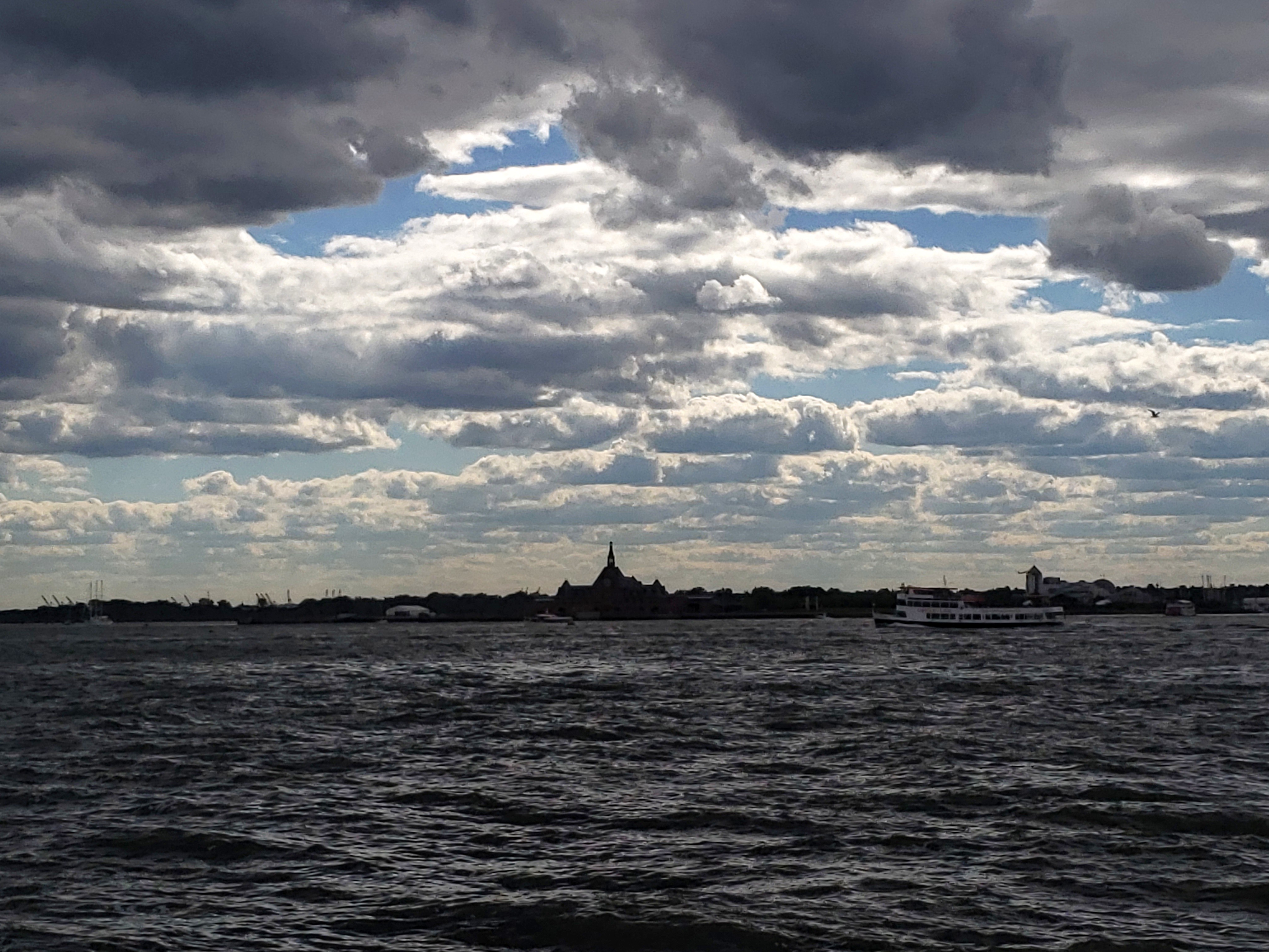 Statue of Liberty covered by an ocean of clouds